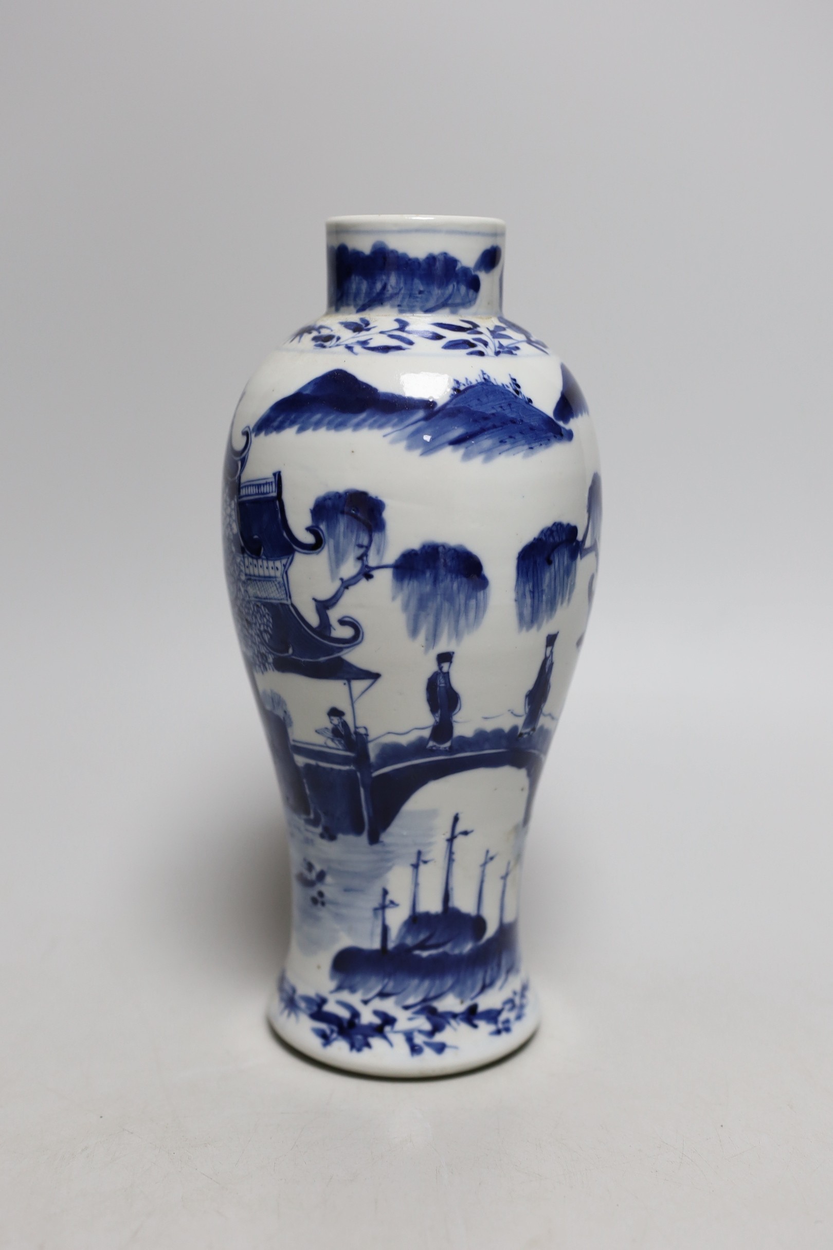 A 19th century Chinese blue and white baluster vase, 23cms high